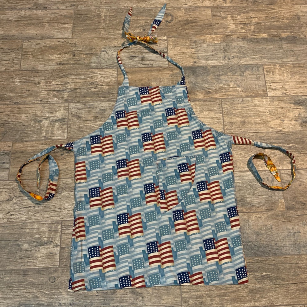 Adult homemade double sided apron with American flag print and scarecrow print